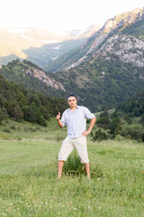 picture man resting in the mountains during summer