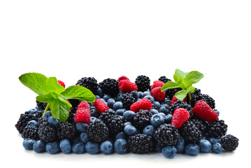 Blackberry, raspberry, blueberry and mint background.