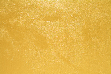 Golden cement wall background