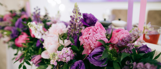 Decoration with purple and pink wedding  flowers  wedding reception