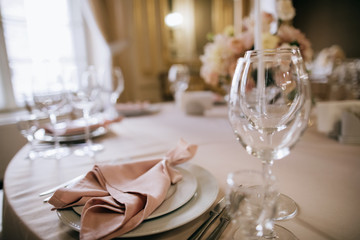 elegant table setting  in pastel beige tones