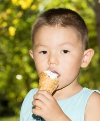 Boy eats ice cream