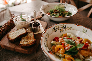 Pate on a wooden board and toast