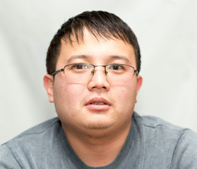 Obraz premium Man wearing glasses Asian look good mood