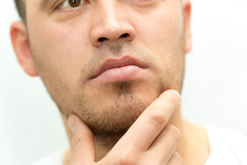 man thinks shave his beard or not