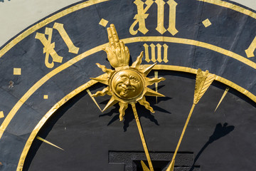 branch with the sun on the zytglogge clock tower in Bern, Switzerland