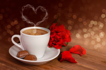 Coffee cup with heart- shaped steam. Valentines day concept. 