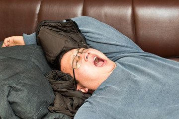 man sleeping on the couch