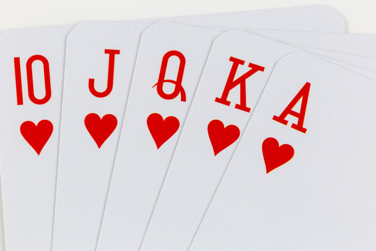 Playing cards, straight on white background macro photo