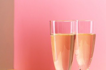Close up photo of two champagne glasses