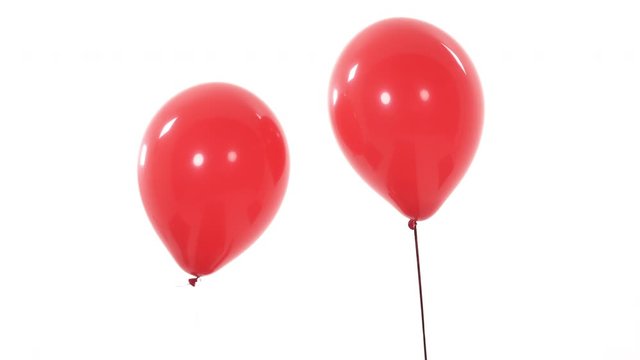 Two red flying balloons. Isolated, on white background.