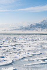 China Xinjiang Sayram Lake(sailimu hu) in winter. Climate and travel concept.