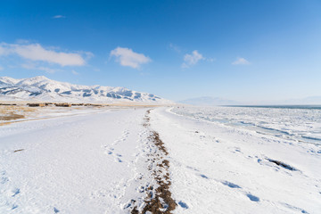 China Xinjiang Sayram Lake(sailimu hu) in winter. Climate and travel concept.