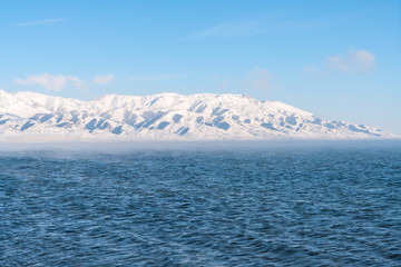 Blue lake with peaceful wave loacted in Xinjiang China named Sayram(sailimu). Winter season.