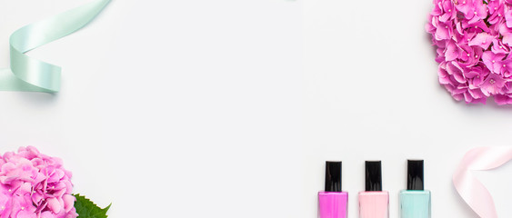 Decorative cosmetics, nail polish. Set of different varnishes for manicure nails on light...