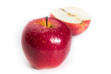 Cut red apple fruits isolated on white background