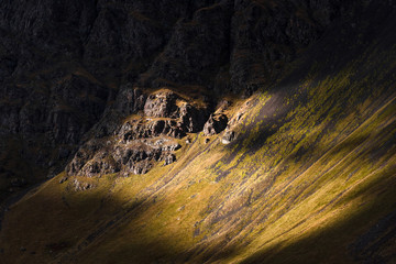 beautiful landscape in the highlands, textural hills with incident light.