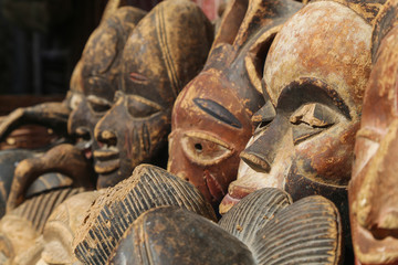 Moroccan masks are sold on the street of the ancient medina