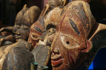 Moroccan masks are sold on the street of the ancient medina