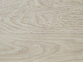 Wooden background made of natural wood planks parquet with pattern of lines and knot as a beige wallpaper used in home decoration