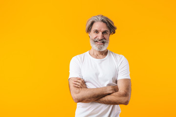 Positive elderly grey-haired bearded man