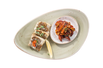 fried fish fillet in mustard with fried zucchini and eggplant isolated on white background