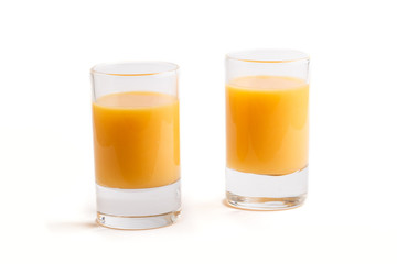 Sweet egg liqueur in glass isolated on white background. Side view - obrazy, fototapety, plakaty
