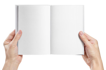 Hands holding an open book with blank pages, isolated on white background