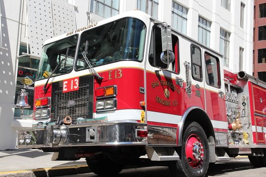 SAN FRANCISCO, USA - APRIL 9, 2014: San Francisco fire engine parked in the street. SF Fire Department responded to 120,536 emergency calls in 2012.