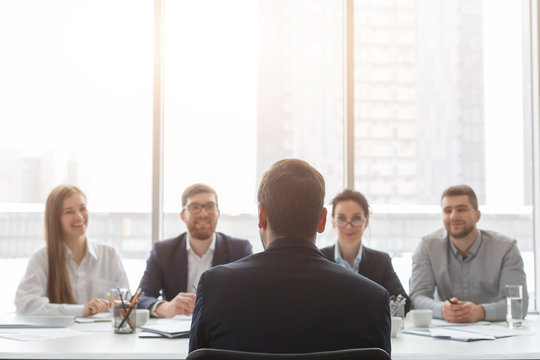 Male Applicant Talking At Job Interview To Hr Comission