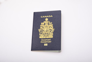 Close up view of a canadian passport, emigration banner