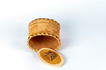 Basket of birch bark (Tuesok) with a lid on a white background. Food container