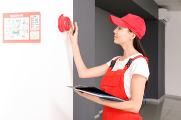Fire safety specialist inspecting building