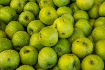 organic fresh green apples at the market 