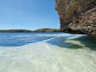 Transparent and turquoise waters of the Caribbean Sea. White sand beach and tropical blue sky....