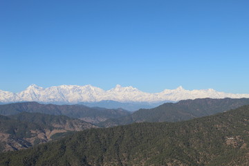 Green Hills along with Snow Mountains