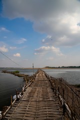 Fototapeta na wymiar old traditional bamboo wooden bridge across Mekong river (from Koh Paen island to Kampong Cham), Cambodia