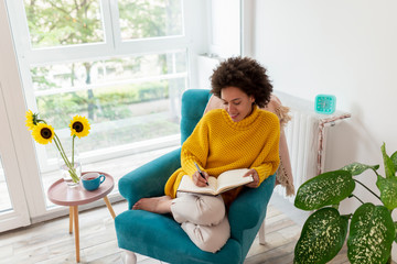 Woman writing a diary