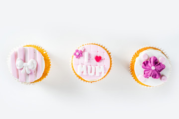 Happy moms day greeting background. Mothers day sweet cupcakes, with gift boxes, coffee cappuccino...