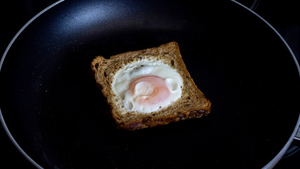 French Toast With An Egg Inside In A Pan. Traditional French Dish Croque-Madame