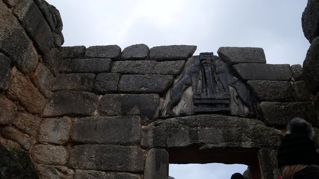 Argolis, Peloponnese, Greece, close-up of Lion Gate at Mycenae a monumental sculpture of Bronze Age. Historical entrances to archaeological site of Mycenae, UNESCO World Heritage Site.
