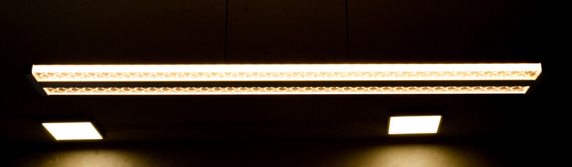 led lamp in the dark, interesting pattern, dark background