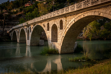 Fototapeta na wymiar Gorica bridge over Osum river, Berat, Albania