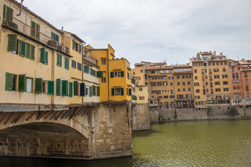 Fototapeta na wymiar Arno river and Ponte Vecchio bridge, Florence, Italy