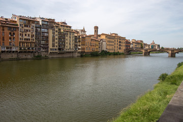 Fototapeta na wymiar Arno river and Ponte Santa Trinita bridge, Florence, Italy
