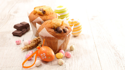 chocolate muffin with easter egg and candy