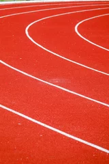 Gordijnen Athletic running track for running race. Sport and excercise concept. © Golden House Images