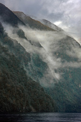 Doubtful Sound. Fiordland. New Zealand. Clouds mountains