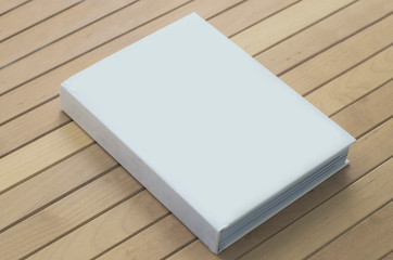White book Mockup on wooden table background