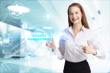 Business, Technology, Internet and network concept. Young businessman working on a virtual screen of the future and sees the inscription: Change management